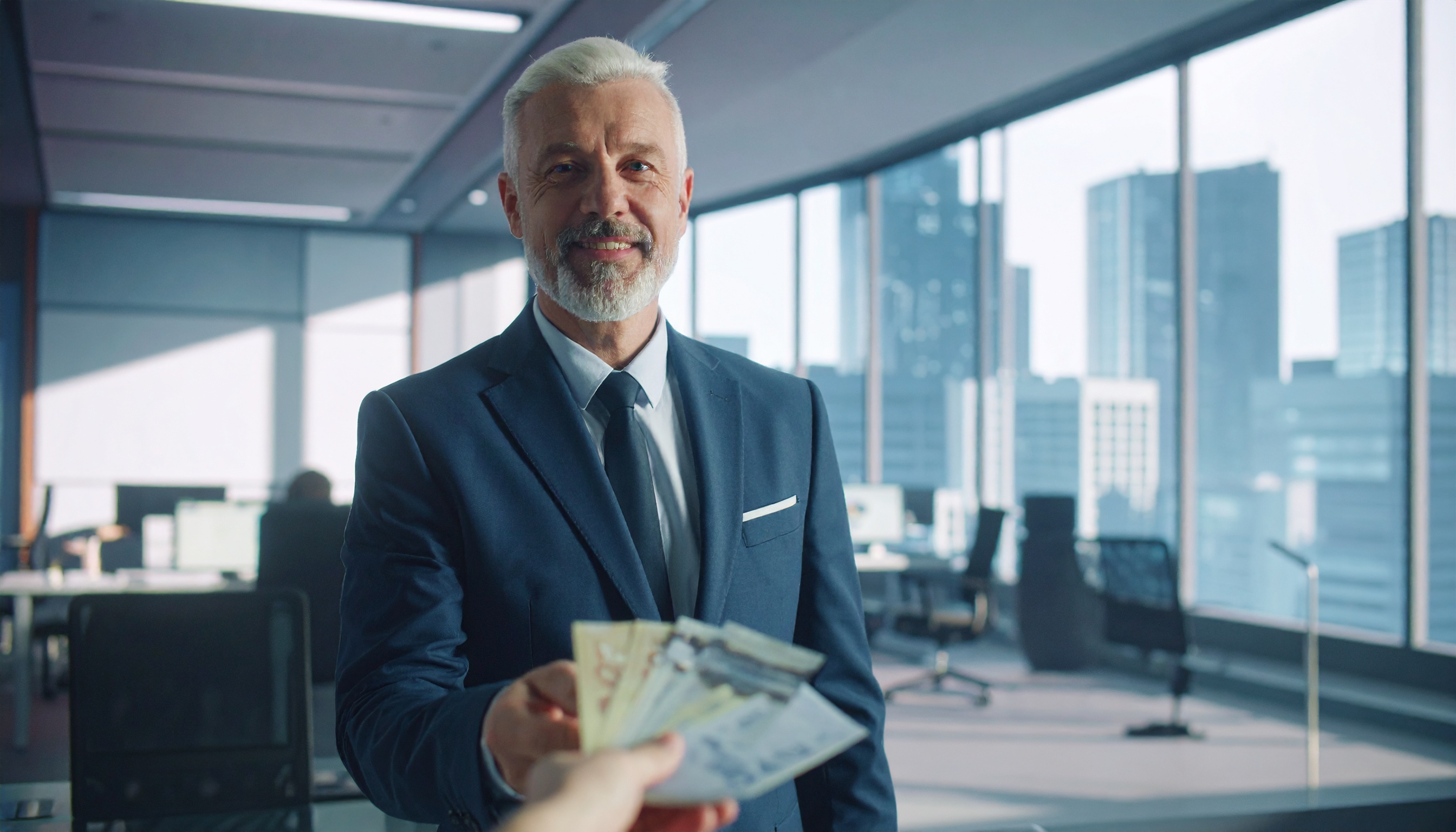 A pensioner receiving his pension in Canada.