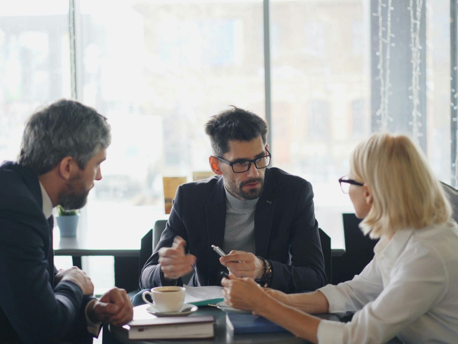An adviser guiding an expat through a protection review